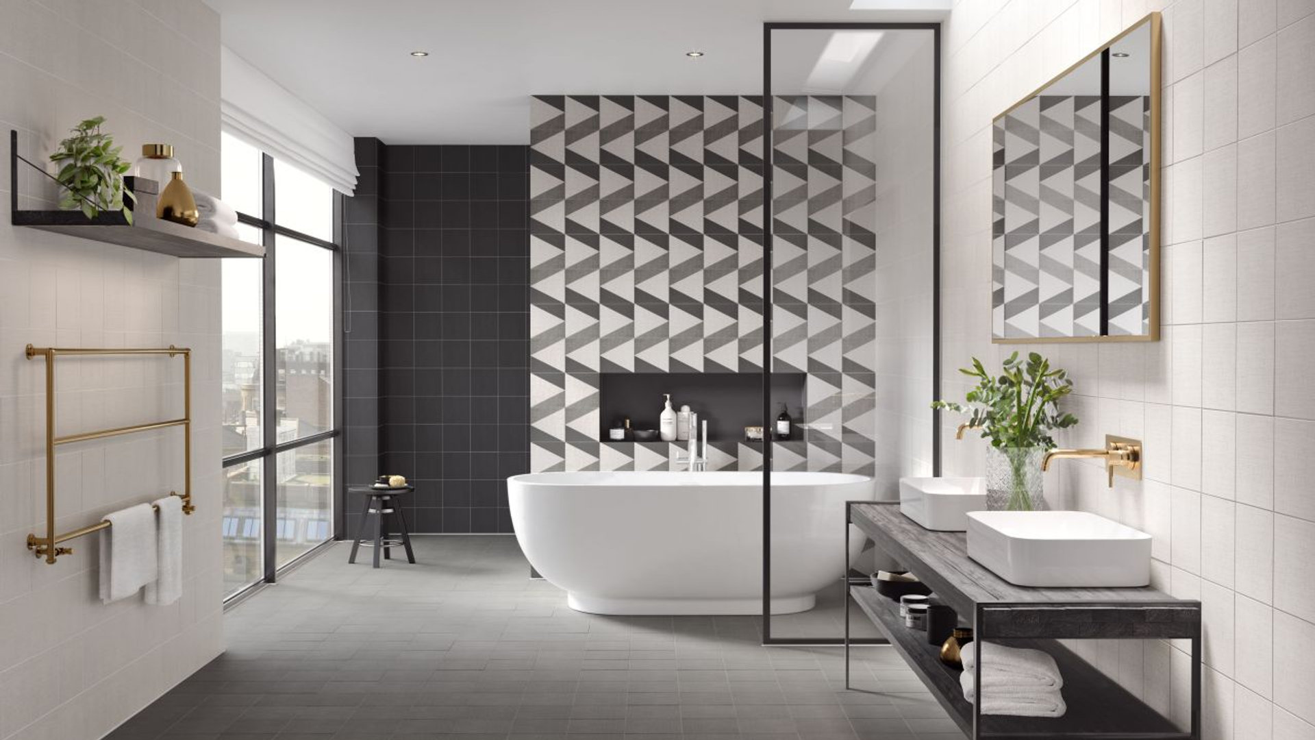 Luxury bathroom with freestanding bath and patterned tiling